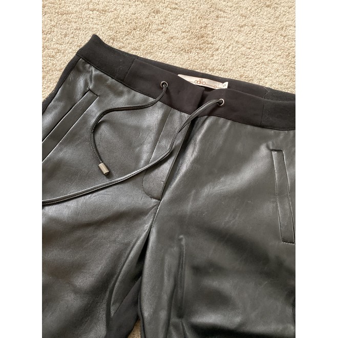 Second black polyester pants | Next