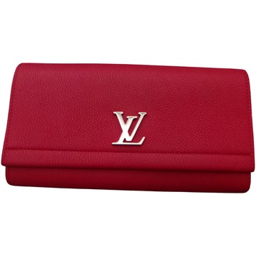 Used Louis Vuitton City Steamer Wallets - Joli Closet